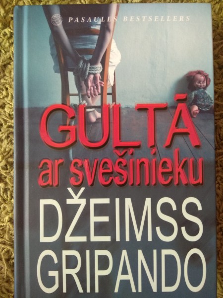 Gultā ar svešinieku