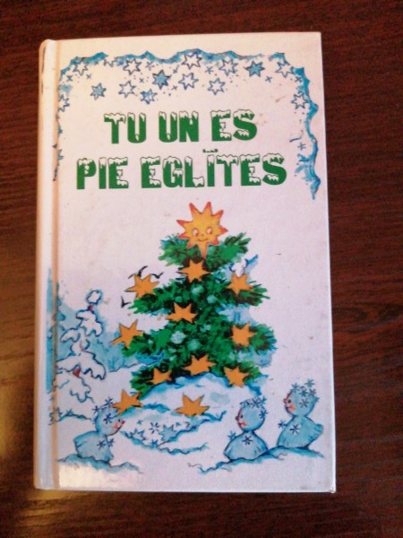 Tu un es pie eglītes