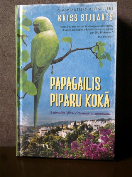 Papagailis piparu kokā