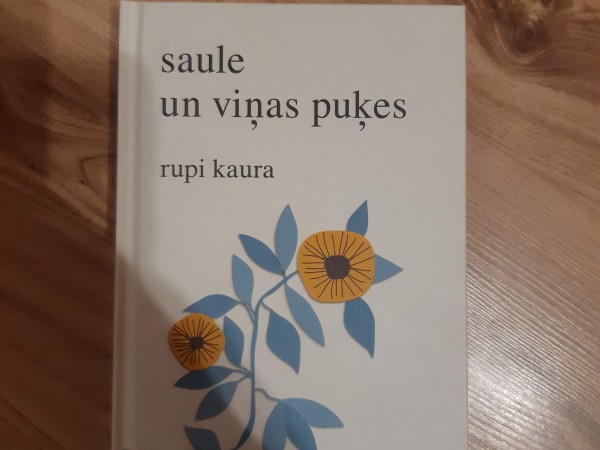 Saule un viņas puķes