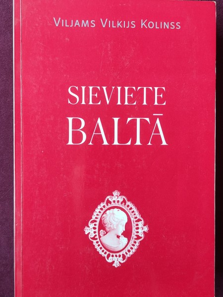 Sieviete baltā