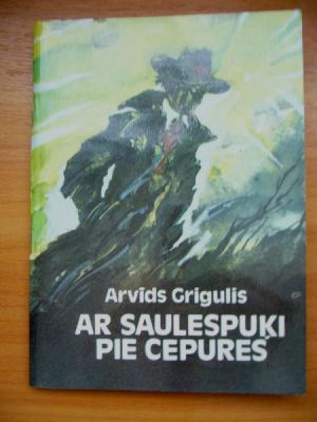 Ar saulespuķi pie cepures