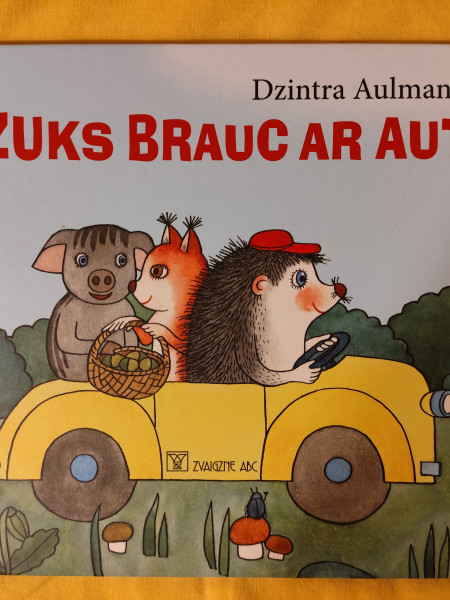 Ežuks brauc ar auto